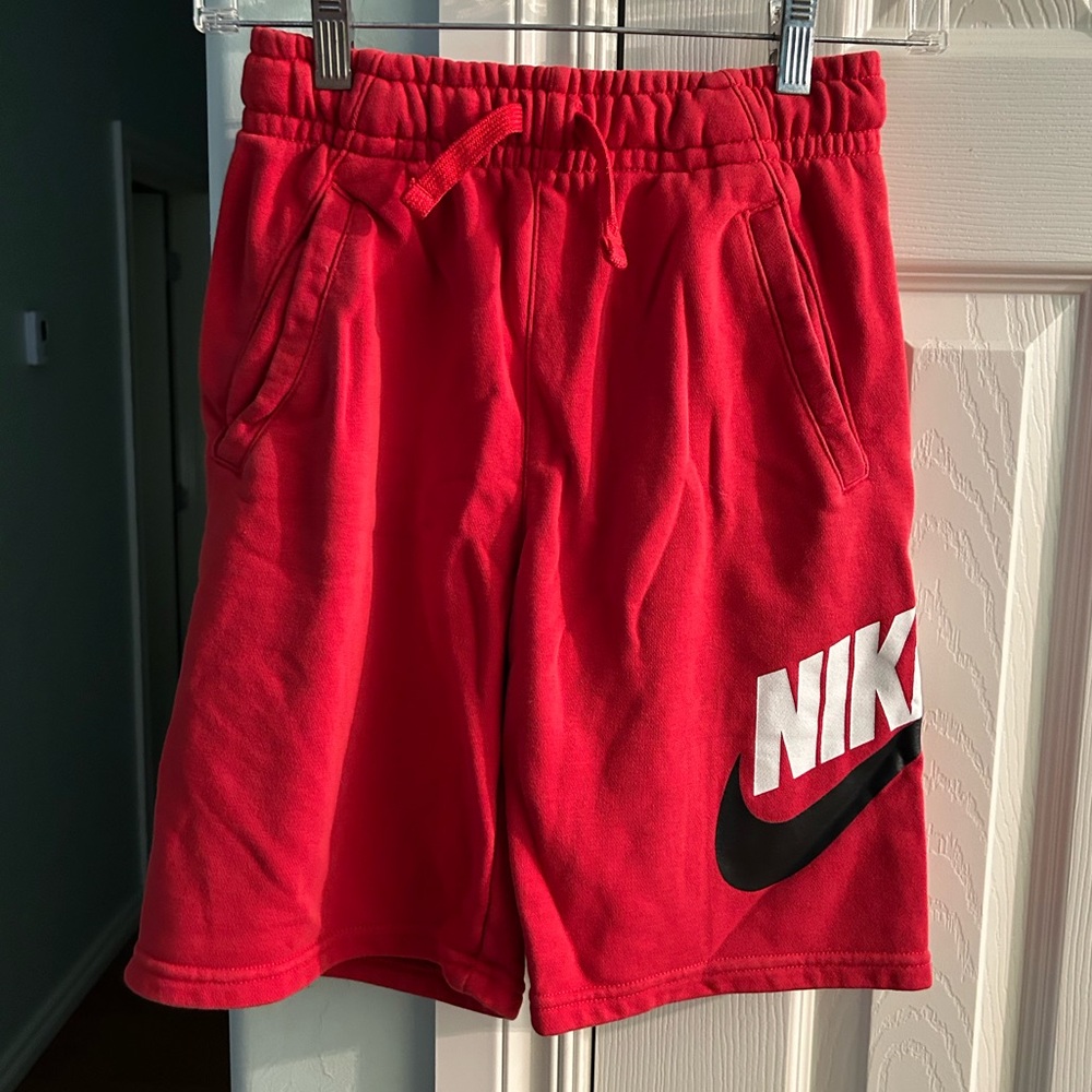 Nike Red Terry/Sweat Shorts with Black Swoosh Detail. Size Youth Large.